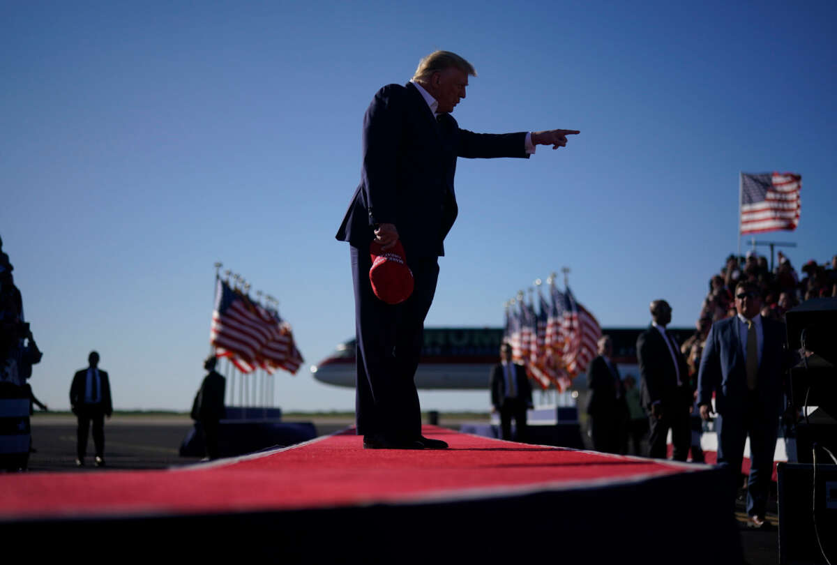 Former president Donald Trump arrives for a campaign rally at Waco Regional Airport in Waco, Texas, on March 25, 2023.