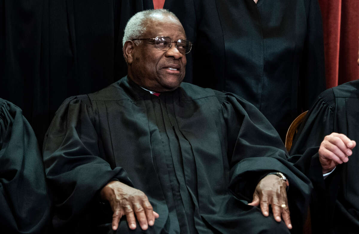 Associate Justice Clarence Thomas is pictured as justices of the United States Supreme Court sit for their official group photo at the Supreme Court on November 30, 2018, in Washington, D.C.