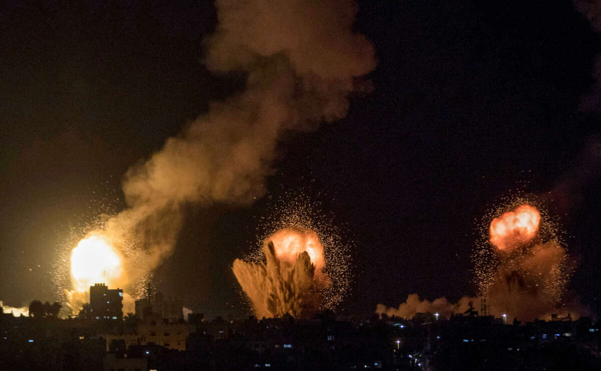 This picture taken early on April 7, 2023, shows explosions in Khan Yunis in the southern Gaza Strip during Israeli air strikes on the Palestinian enclave.