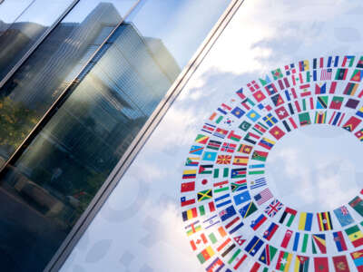 World Bank headquarters seen reflected in a window of the International Monetary Fund headquarters in Washington, D.C., on October 8, 2022.