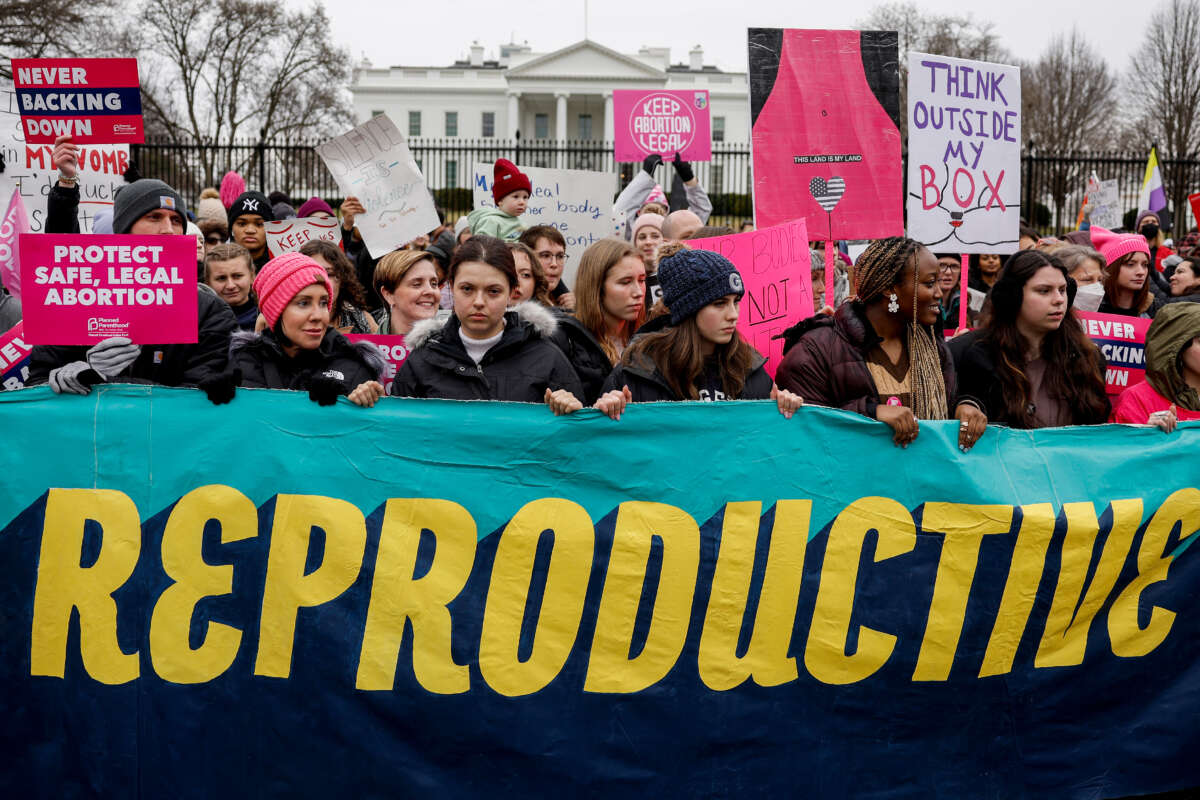 People protest in front of the White House during the annual National Women's March on January 22, 2023, in Washington, D.C.