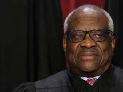 Supreme Court Associate Justice Clarence Thomas poses for an official portrait at the East Conference Room of the Supreme Court building on October 7, 2022, in Washington, D.C.