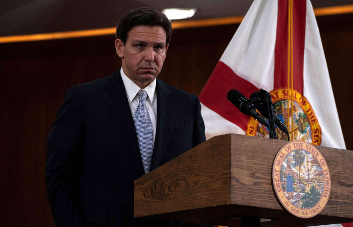 Florida Gov. Ron DeSantis answers questions from the media in the Florida Cabinet at the Florida State Capitol in Tallahassee, Florida, on March 7, 2023.