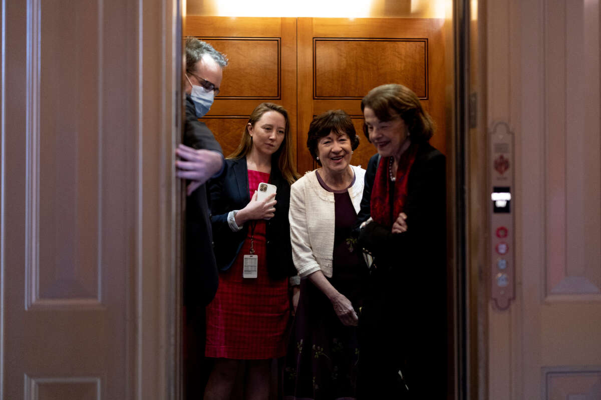 Senators Susan Collins and Dianne Feinstein en route to Senate Chambers for a series of votes in the U.S. Capitol Building on May 11, 2022, in Washington, D.C.