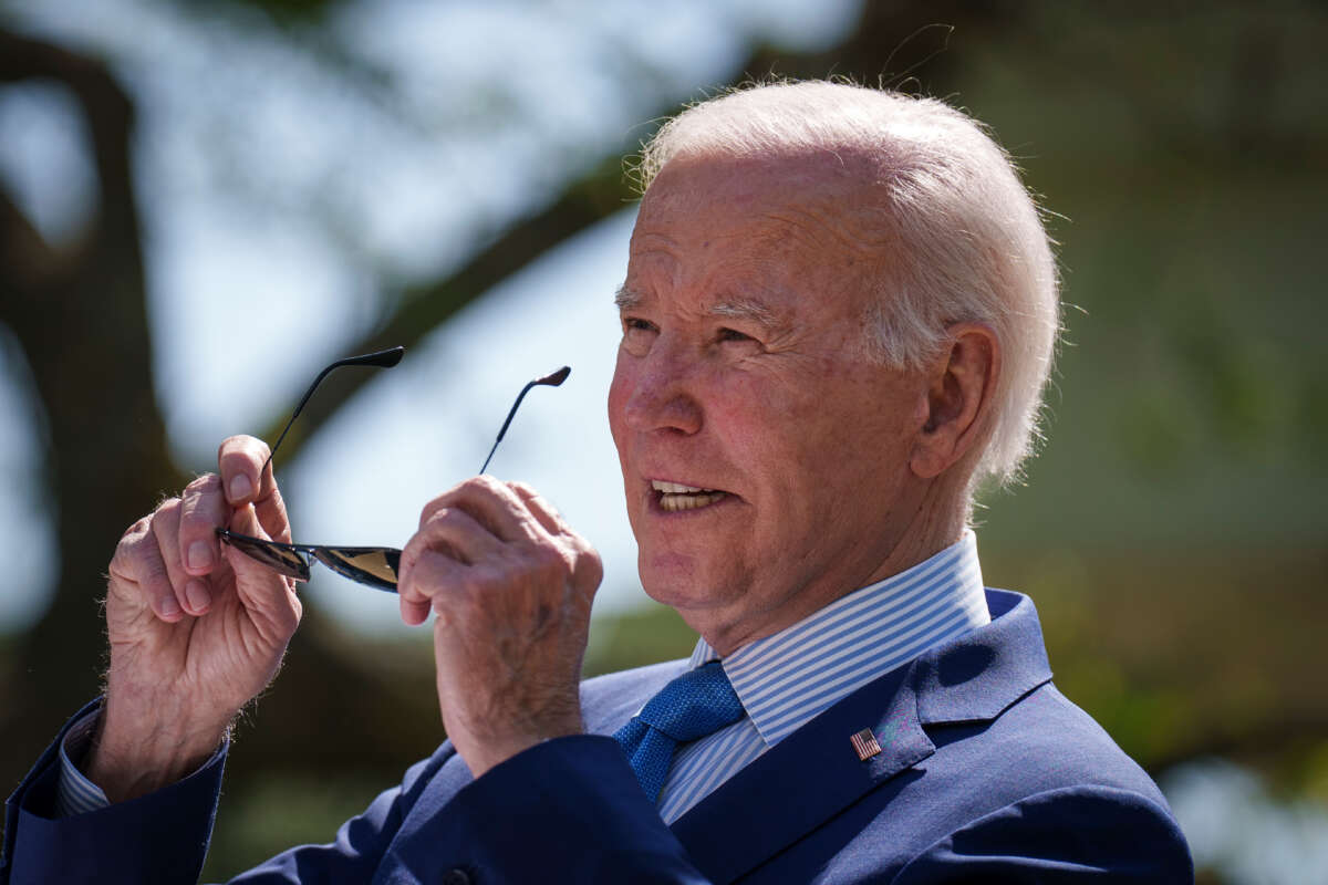 President Joe Biden puts on his sunglasses as he speaks before signing an executive order that would create the White House Office of Environmental Justice, in the Rose Garden of the White House on April 21, 2023, in Washington, D.C.