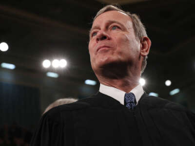 Supreme Court Chief Justice John Roberts stands in the House chamber on February 4, 2020, in Washington, D.C.