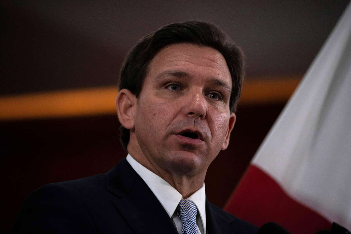 Florida Gov. Ron DeSantis answers questions from the media in the Florida Cabinet at the Florida State Capitol in Tallahassee, Florida, on March 7, 2023.