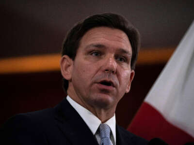 Florida Gov. Ron DeSantis answers questions from the media in the Florida Cabinet at the Florida State Capitol in Tallahassee, Florida, on March 7, 2023.