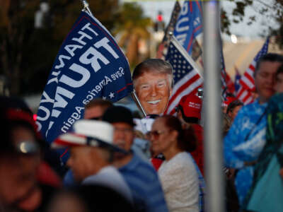 Supporters of former President Donald Trump gather near his residence at the Mar-a-Lago Club on April 4, 2023, in West Palm Beach, Florida.