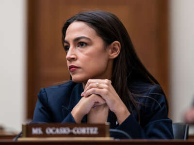 Rep. Alexandria Ocasio-Cortez listens during a hearing in the Rayburn House Office Building at the U.S. Capitol on December 13, 2022, in Washington, D.C.