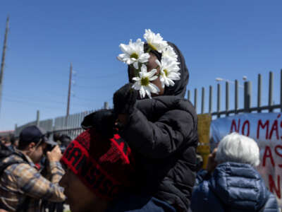 Hundreds of migrants go to the migration offices to request information about the victims caused by a fire inside the detention center of the migration institute in Ciudad Juárez, Mexico, on March 28, 2023.