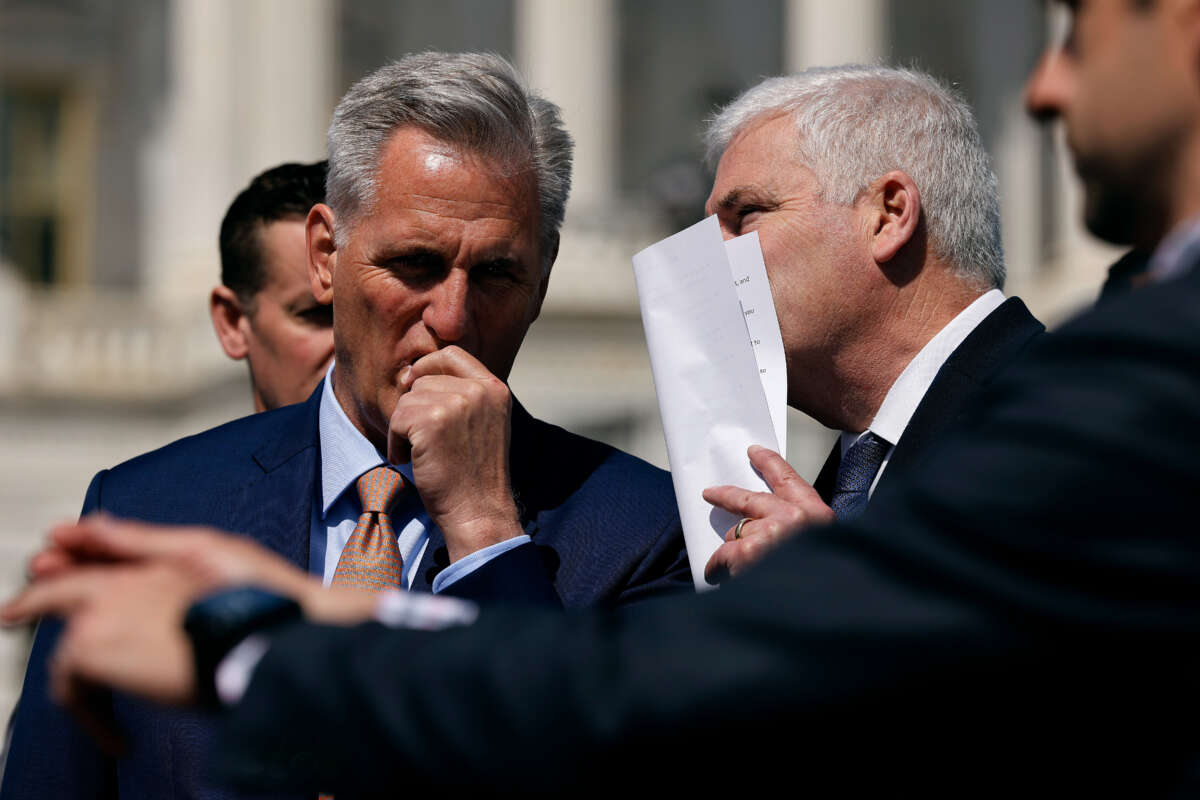 House Speaker Kevin McCarthy (left) listens to Majority Whip Don Emmer during an event to celebrate the House passing an anti-trans school sports bill outside the U.S. Capitol on April 20, 2023, in Washington, D.C.