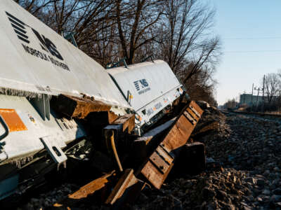 A train derails with several cars veering off track in Van Buren Township, Michigan on February 18, 2023.