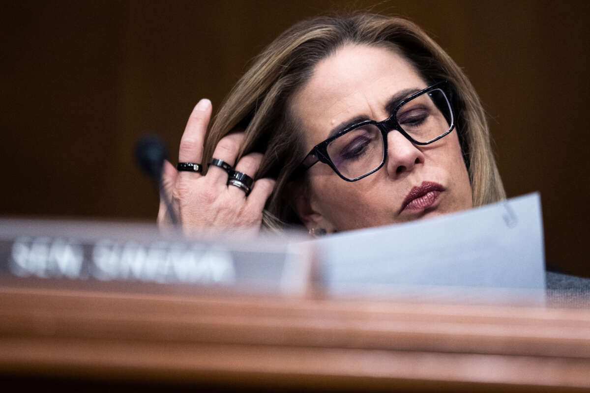 Sen. Kyrsten Sinema attends a Senate Homeland Security and Governmental Affairs Committee markup in Dirksen Building on March 15, 2023.
