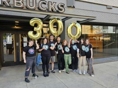 Starbucks workers celebrate the 300th store to unionize in Sacramento, California.