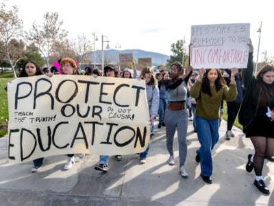 Great Oak High School students leave campus in protest of the district's ban on "critical race theory" curriculum at Patricia H. Birdsall Sports Park in Temecula, California, on December 16, 2022.