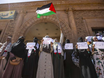 People carrying placards gather to stage a demonstration against the normalization agreement signed with Israel, in Khartoum, Sudan on February 5, 2023.