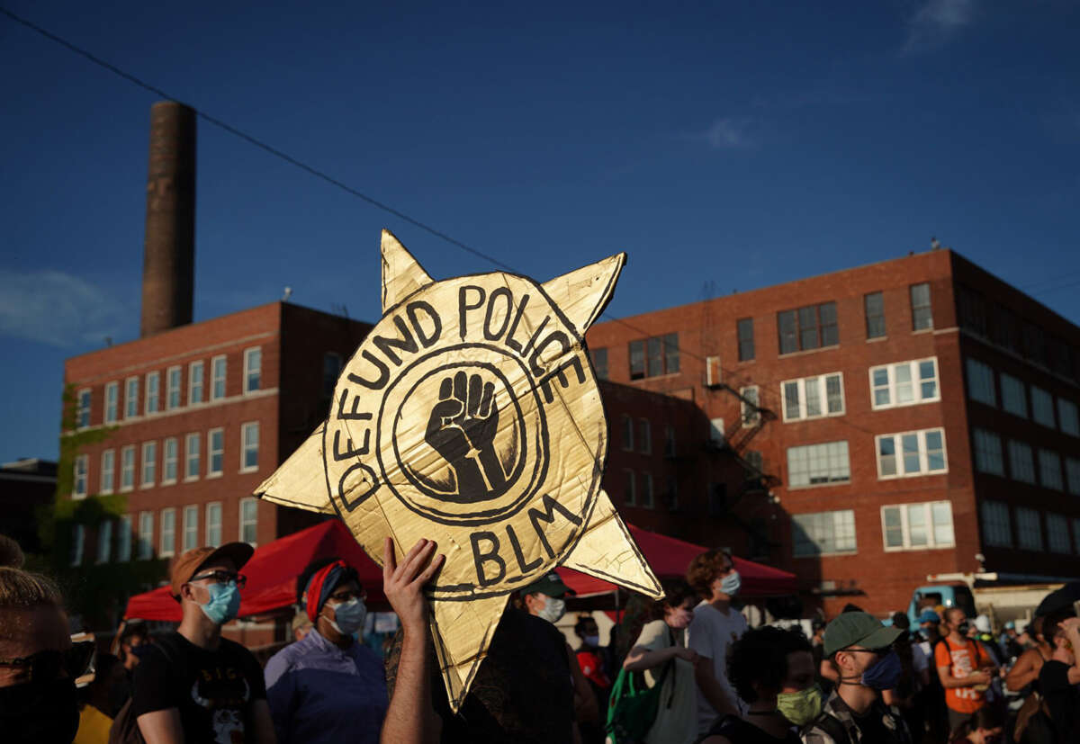 Black-led groups lead a rally to defund police across from the Chicago Police Department's Homan Square facility in Chicago, Illinois, on July 24, 2020.