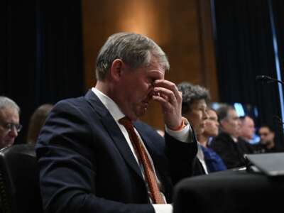 Norfolk Southern Corporation President and CEO Alan Shaw testifies before a U.S. Senate committee hearing on the environmental and public health threats from the Norfolk Southern February 3 train derailment, on March 9, 2023, in Washington, D.C.