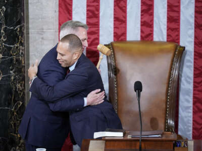 Rep. Hakeem Jeffries hugs Rep. Kevin McCarthy after handing him the speakers gavel in a meeting of the 118th Congress, Friday, January 6, 2023, at the U.S. Capitol in Washington D.C.