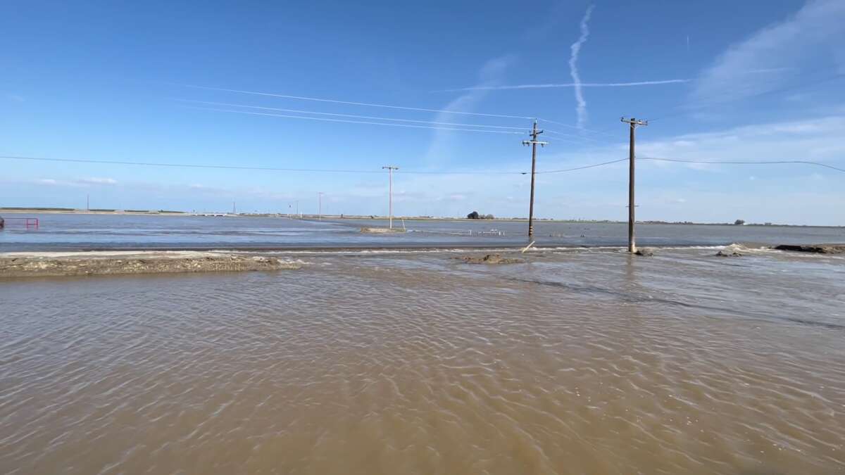 On March 26, 2023, floodwaters breached the levee at the corner of Paris Avenue and Plymouth Avenue, about half a mile east of the prison complex in Corcoran, California. 