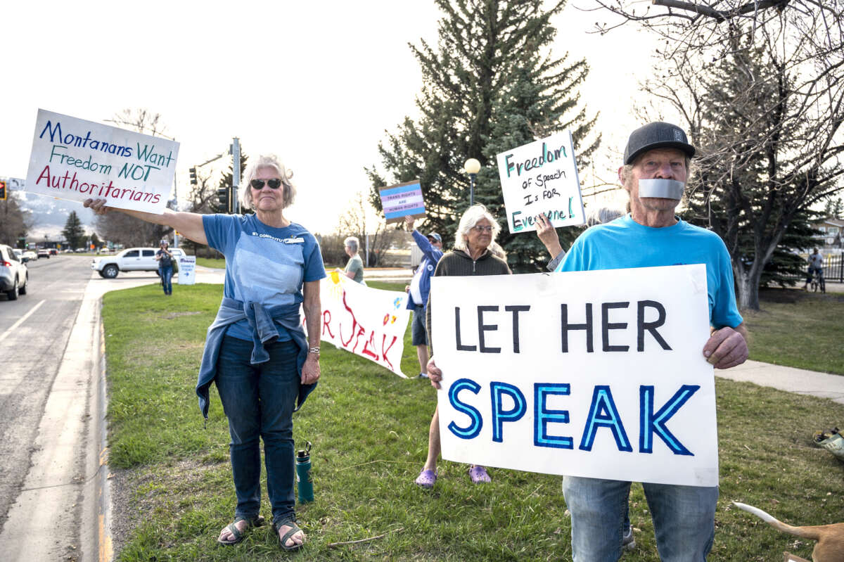 Supporters hold signs near a rally in support of transgender lawmaker Zooey Zephyr on April 29, 2023 in Livingston, Montana.