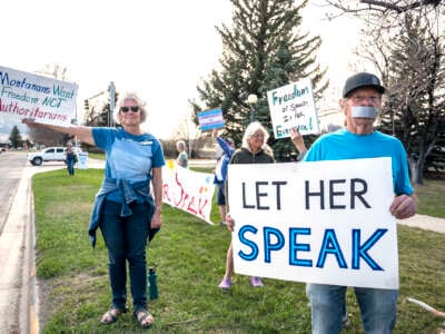 Supporters hold signs near a rally in support of transgender lawmaker Zooey Zephyr on April 29, 2023 in Livingston, Montana.