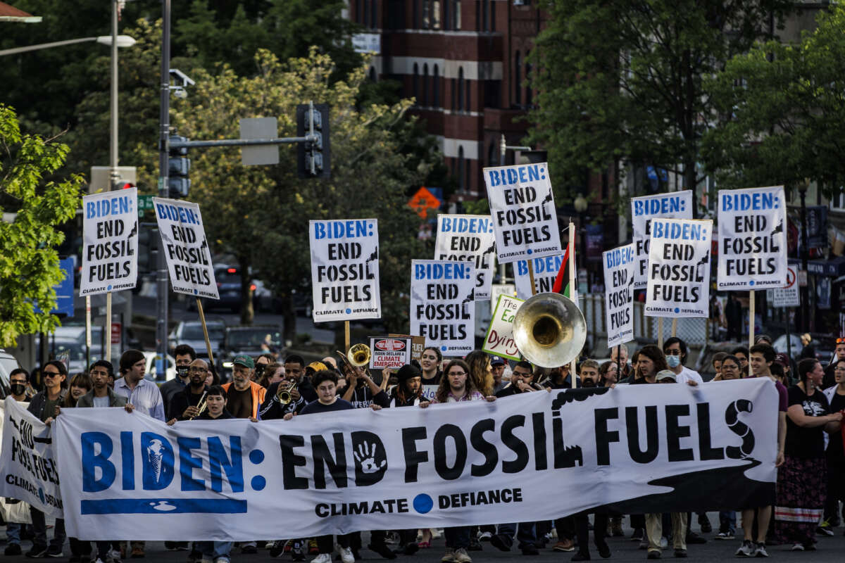 Climate protestors march up Connecticut Avenue towards the White House Correspondents' Dinner at the Washington Hilton on April 29, 2023 in Washington, DC.