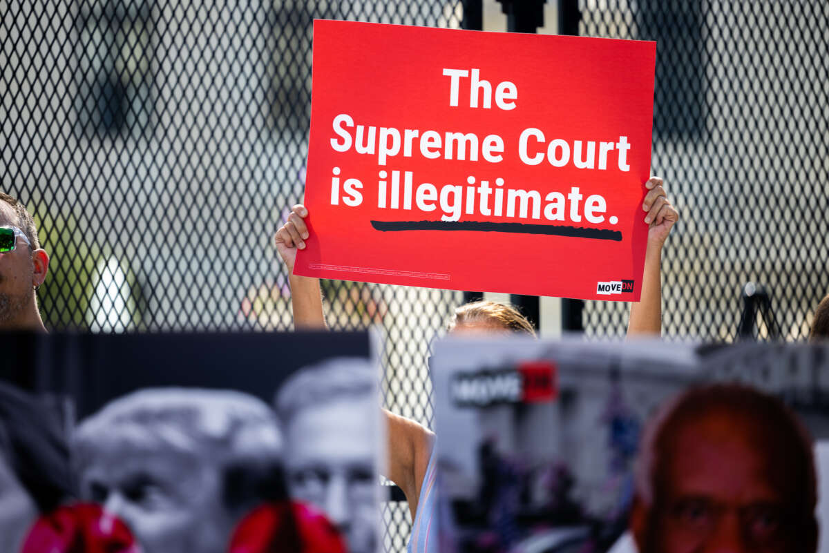 Move On demonstrators are seen in front of the Supreme Court ahead of the delivery of a petition demanding the impeachment of Justice Clarence Thomas on July 28, 2022 in Washington, D.C.
