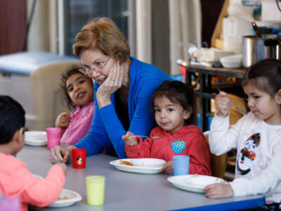 Sen. Elizabeth Warren interacts with children during her campaign event at Wise and Wonderful Daycare and Preschool in San Jose, California, on Dec. 27, 2019.