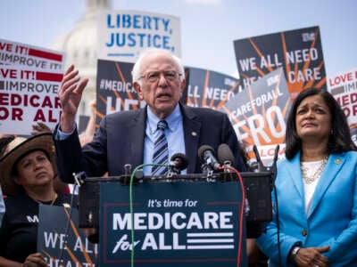 Sen. Bernie Sanders speaks alongside Rep. Pramila Jayapal during a news conference to announce the re-introduction of the Medicare For All Act of 2023 on May 17, 2023 in Washington, D.C.