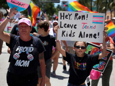 People participate in the 15th annual Miami Beach Pride Celebration parade on April 16, 2023 in Miami Beach, Florida.