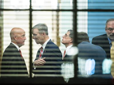 House Republican lawmakers, including then-Representatives-elect Keith Self, Scott Perry, Andrew Clyde, and Rep. Andy Harris, the chair of the House Agriculture, Rural Development, Food and Drug Administration Appropriations Subcommittee, huddle in a conference room Thursday, January 5, 2023.