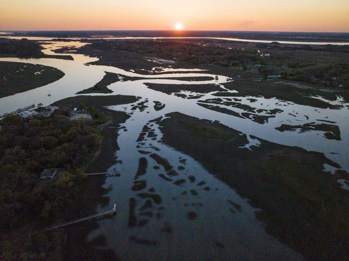 Aerial drone views of snake-like rivers and marshes in low country tidal areas of South Carolina.