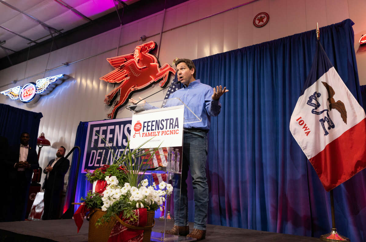 Ron Desantis speaks at a podium