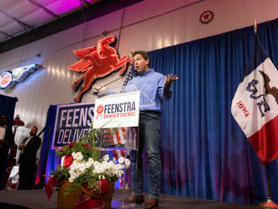 Ron Desantis speaks at a podium