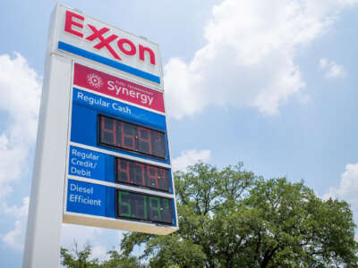Gas prices are seen on an Exxon Mobil gas station sign on June 09, 2022 in Houston, Texas.
