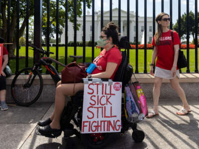 Protestors demonstrate outside the White House to call attention to those suffering from Myalgic Encephalomyelitis and long COVID on September 19, 2022, in Washington, D.C.