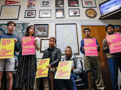 Student loan borrowers stage a sit-in on Capitol Hill at the office of U.S. Speaker of the House Kevin McCarthy to urge him to stop trying to block student debt cancellation on May 9, 2023, in Washington, D.C.