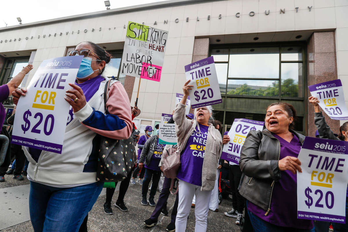 Workers who assist people with disabilities in their homes through the In-Home Supportive Services program urge the Los Angeles County Board of Supervisors to increase their pay on November 1, 2022, in Los Angeles, California.