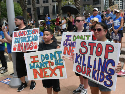 Students and their parents participate in a March For Our Lives rally