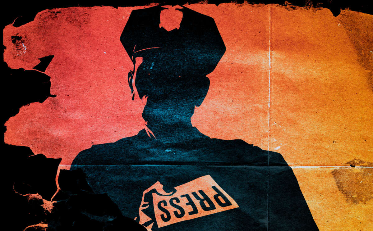 Silhouette of police officer holding press pass