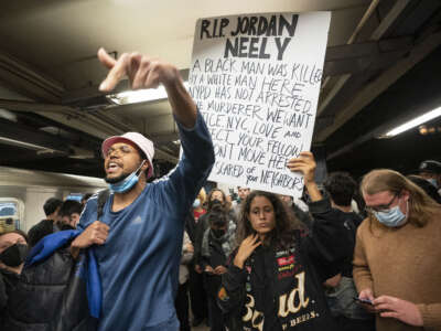 Jordan Neely supporters during a vigil in the Broadway-Lafayette subway station in New York City on May 3, 2023.