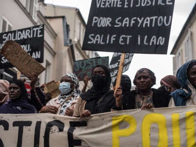 Women march against police violence in Paris, France, on May 7, 2023.