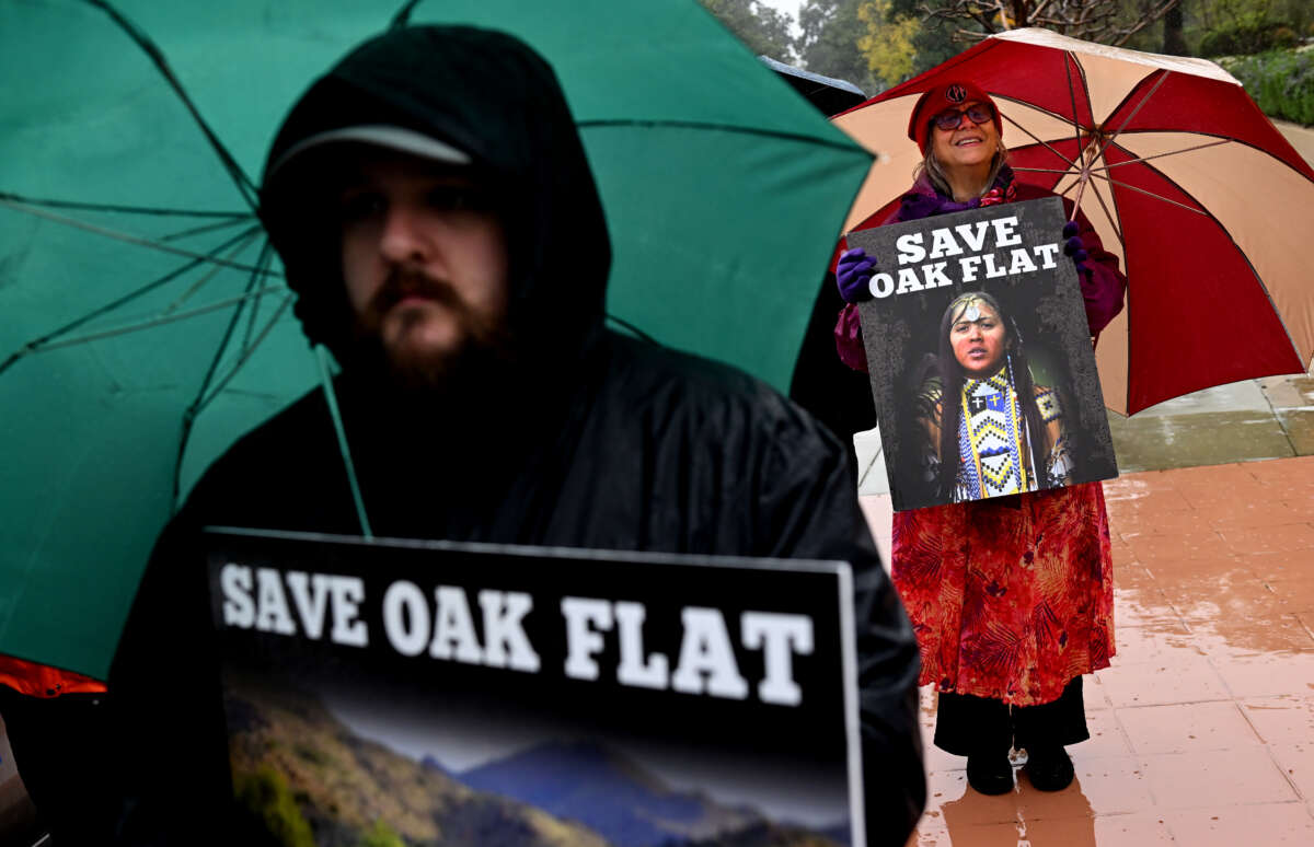 Protestors stand outside the Ninth Circuit Court in Pasadena, California, to challenge a mining deal that would destroy the Oak Flat sacred site in Arizona, on March 21, 2023.