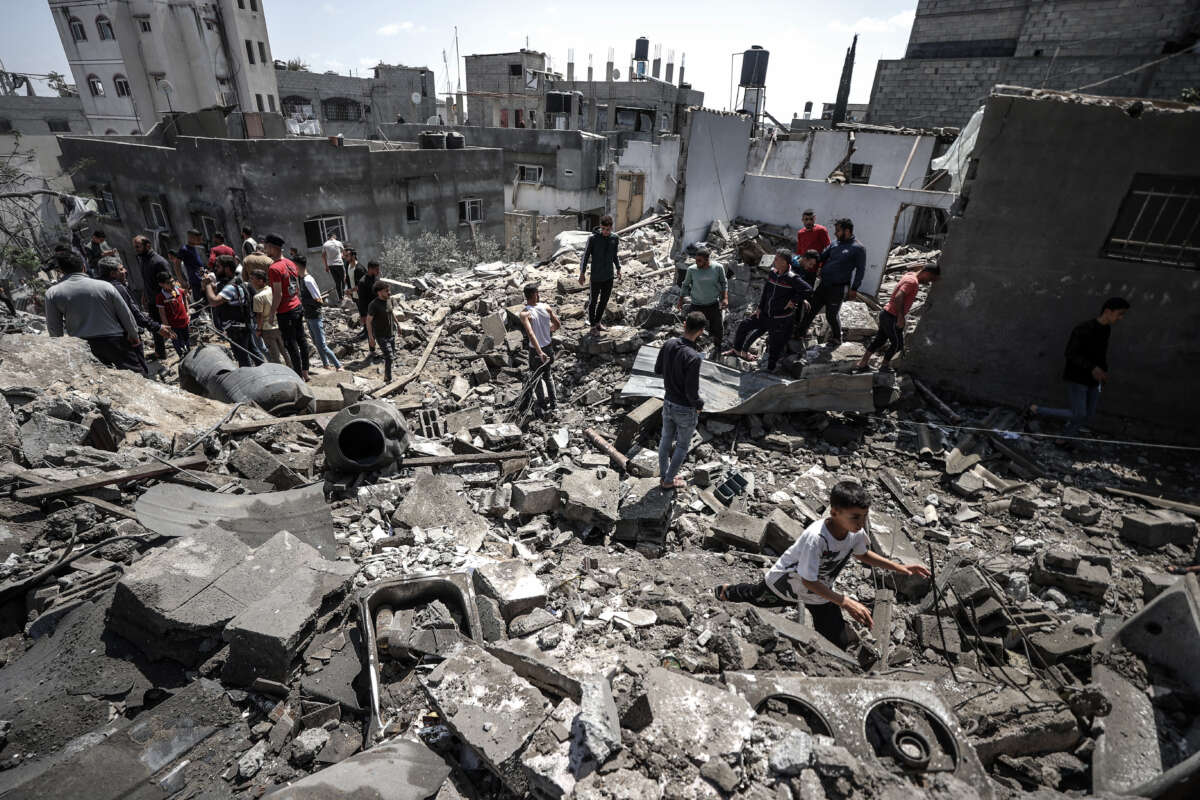 A view from the area where an attack by Israeli warplanes completely destroyed a building in Beit Lahia, in the north of Gaza on May 12, 2023.