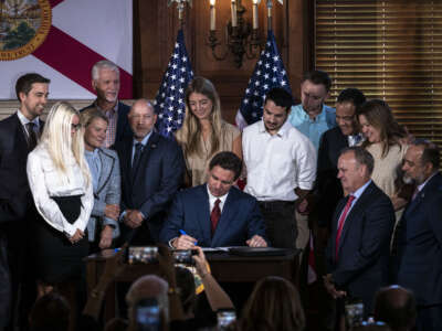 Florida Governor Ron DeSantis signs three education bills into law on Monday, May 15, 2023, at the New College of Florida campus in Sarasota, Florida.