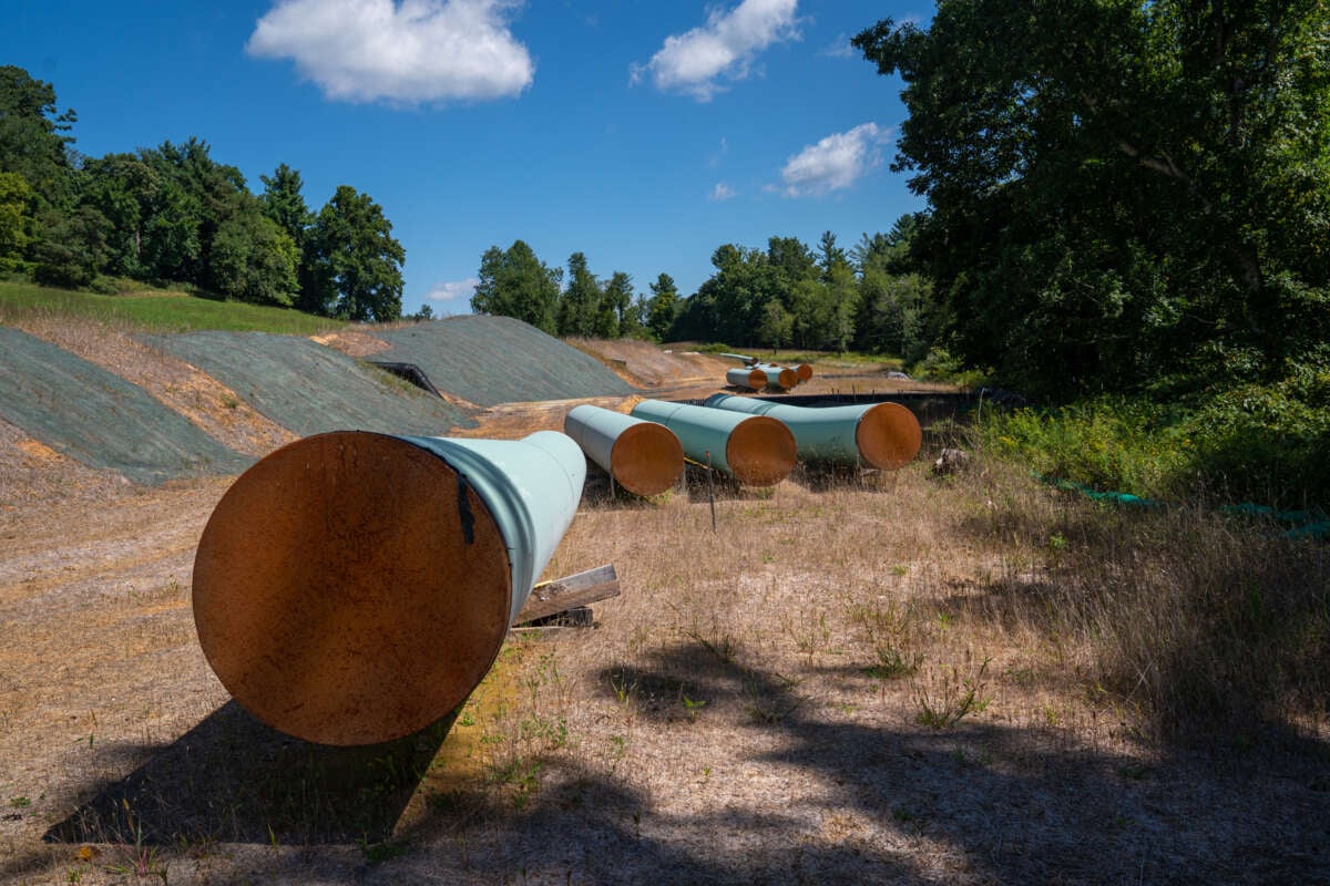 Sections of the Mountain Valley Pipeline lie on wooden blocks in Bent Mountain, Virginia, on August 31, 2022.