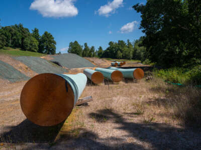 Sections of the Mountain Valley Pipeline lie on wooden blocks in Bent Mountain, Virginia, on August 31, 2022.