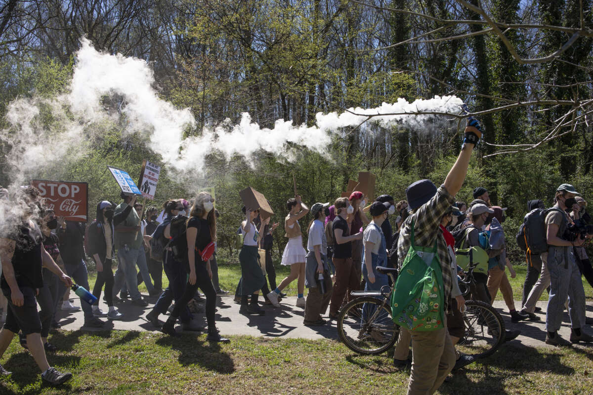 Environmental activists hold a rally and a march through the Atlanta Forest on March 4, 2023.